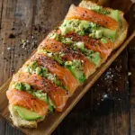 Lachs Avocado Laugenstange mit Topping